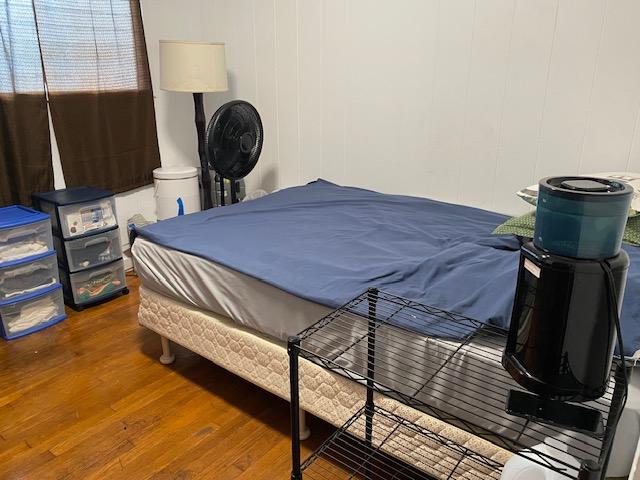 bedroom featuring hardwood / wood-style floors