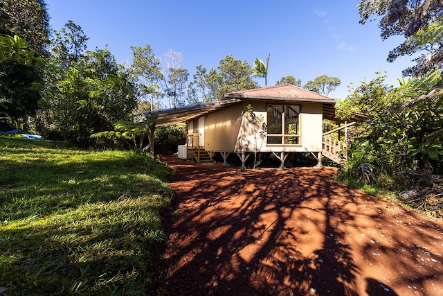 exterior space featuring a yard