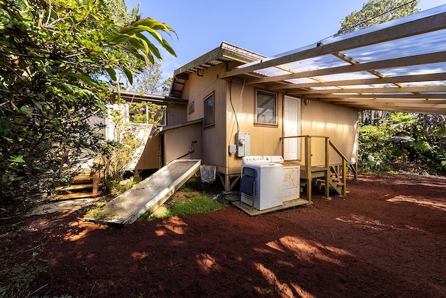 exterior space with washer / dryer