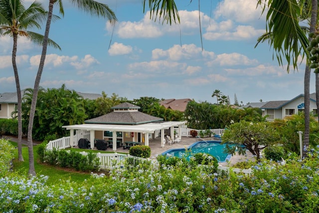 view of swimming pool with a patio