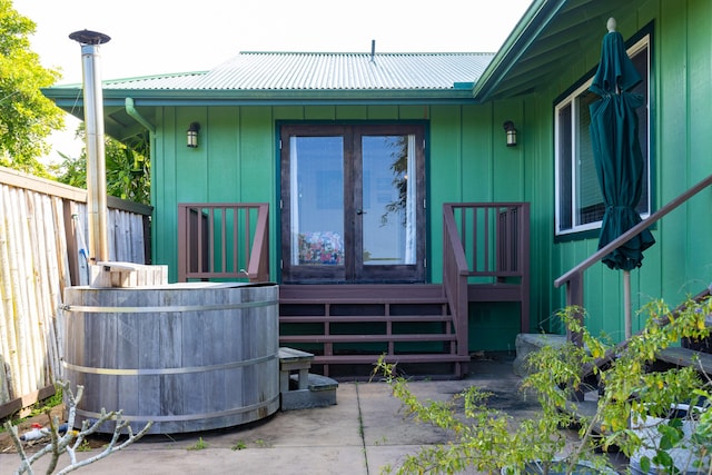 back of house featuring french doors