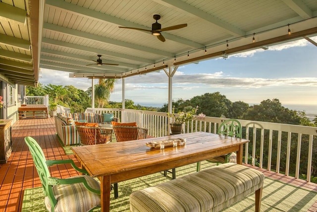 wooden terrace featuring ceiling fan