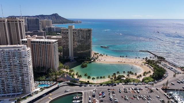 aerial view with a beach view and a water view