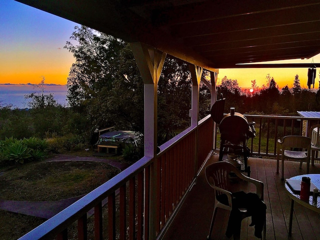 wooden balcony featuring a wooden deck