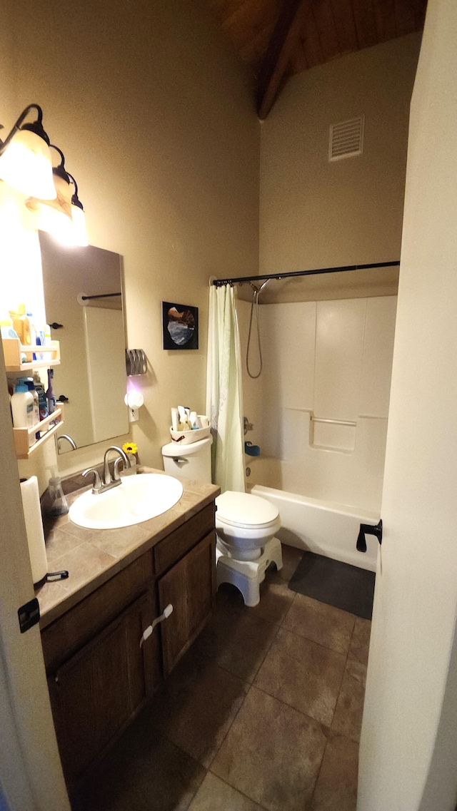 full bathroom with tile patterned floors, vanity, shower / bathtub combination with curtain, and toilet