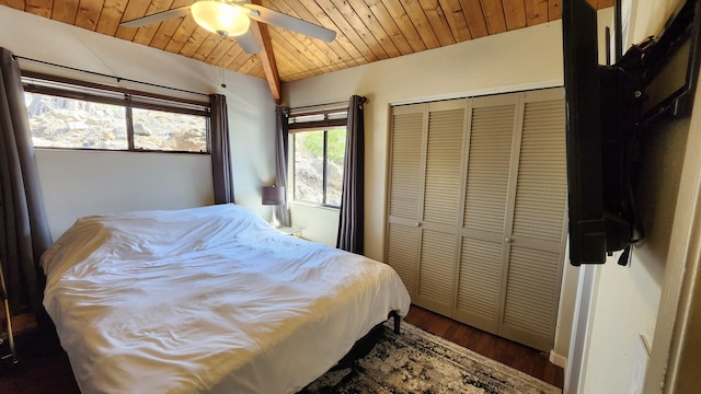 bedroom with ceiling fan, a closet, wooden ceiling, and hardwood / wood-style flooring