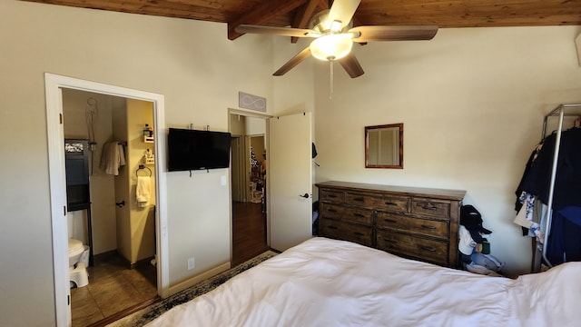 bedroom featuring beamed ceiling, ceiling fan, wooden ceiling, and ensuite bath