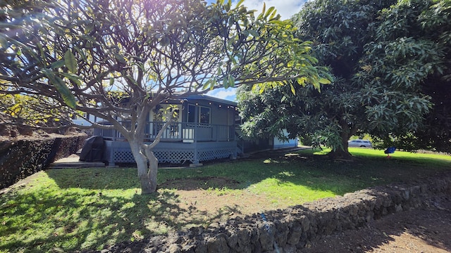 view of yard with a deck