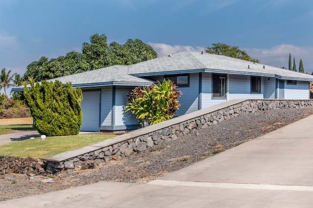 ranch-style house with a garage