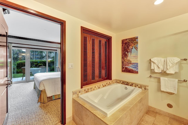 bathroom featuring tiled bath