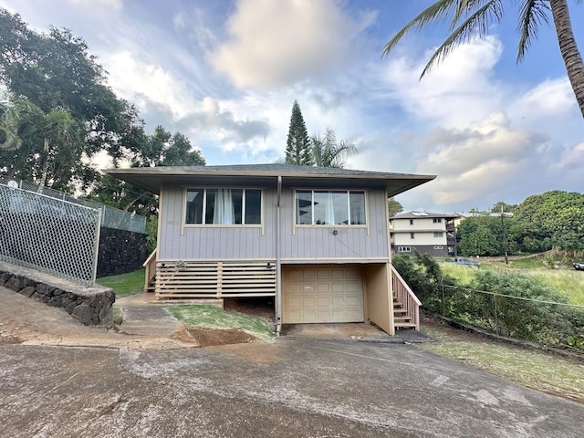 view of front of property with a garage