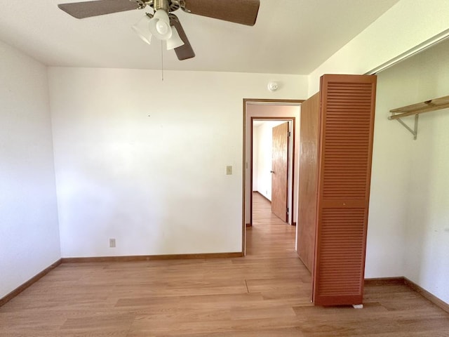 unfurnished room with ceiling fan and light hardwood / wood-style floors