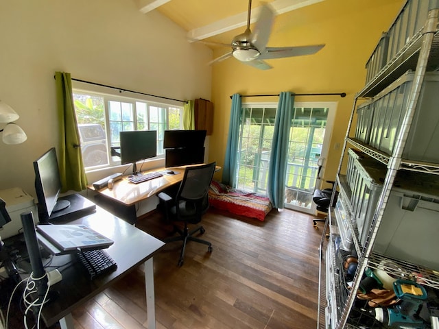 office space featuring hardwood / wood-style floors, ceiling fan, beam ceiling, and a high ceiling