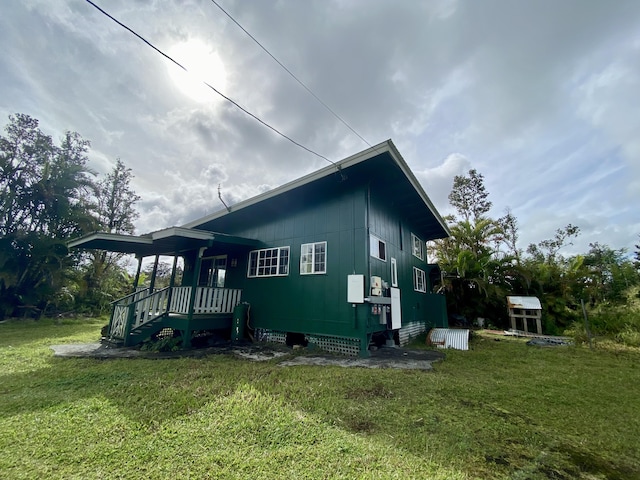 view of home's exterior featuring a lawn