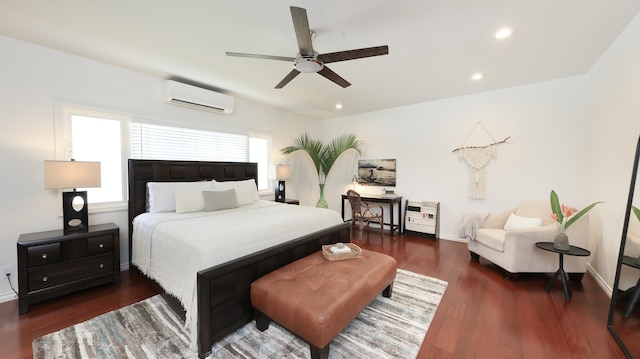 bedroom with a wall mounted air conditioner, ceiling fan, and dark hardwood / wood-style flooring