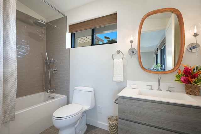 full bathroom featuring tile patterned flooring, shower / bath combination with curtain, vanity, and toilet