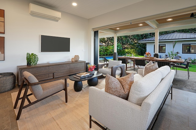 view of patio / terrace featuring a wall mounted AC and an outdoor living space