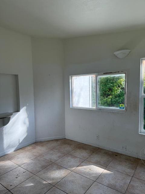 view of tiled spare room