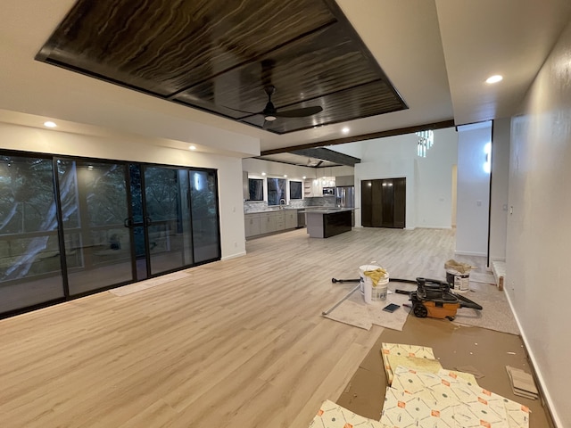 interior space featuring ceiling fan and light hardwood / wood-style floors