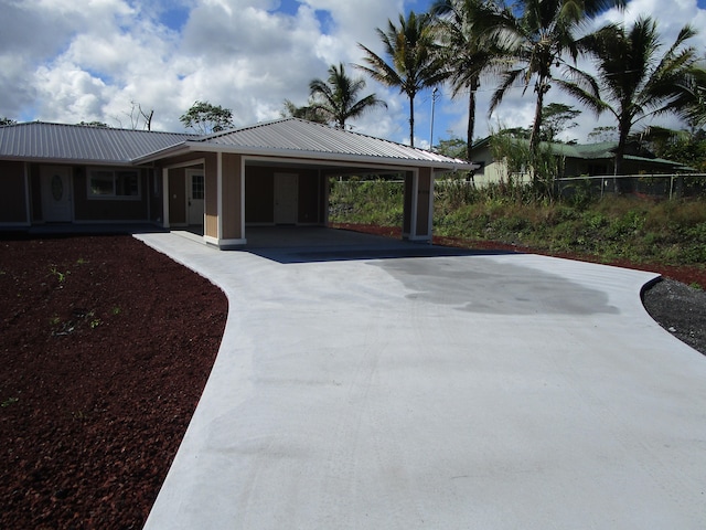 view of patio featuring a carport