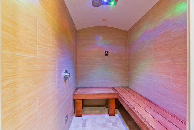 view of sauna with brick ceiling