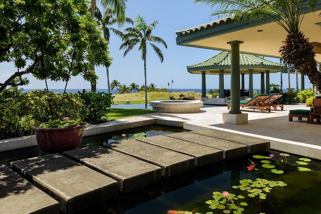 view of home's community featuring a gazebo and a patio area