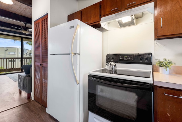 kitchen with wood ceiling, white appliances, ceiling fan, dark wood-type flooring, and beamed ceiling