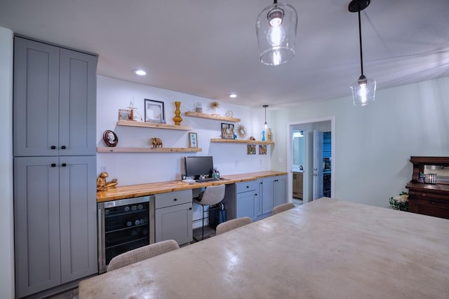 bedroom featuring wine cooler and a closet