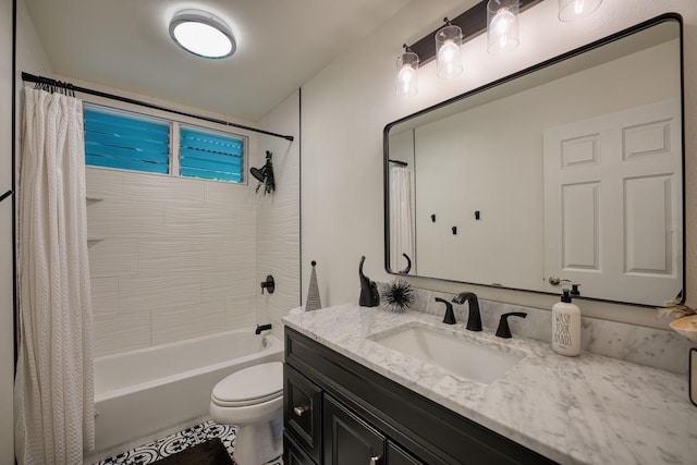 full bathroom featuring shower / tub combo, vanity, and toilet