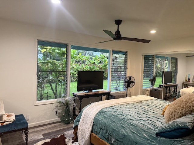 bedroom featuring ceiling fan and wood-type flooring