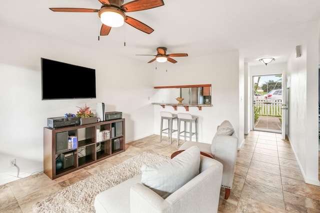 living room with ceiling fan