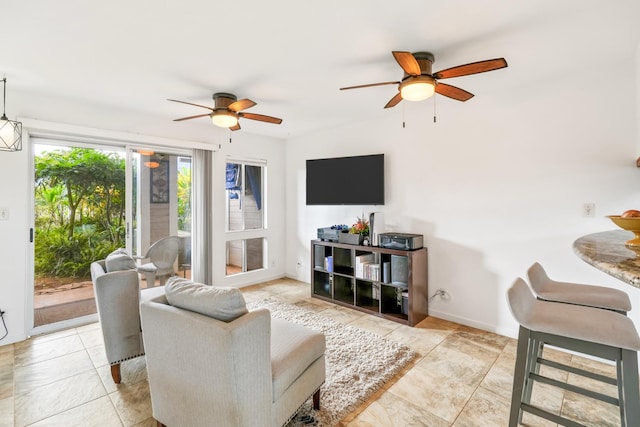 living room featuring ceiling fan