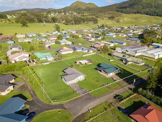 drone / aerial view featuring a mountain view