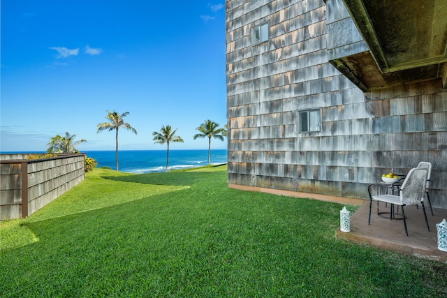 view of yard with a water view