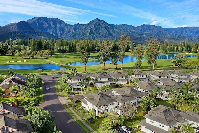 bird's eye view with a water and mountain view