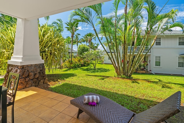 view of yard featuring a balcony