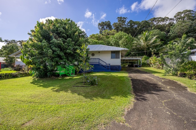 view of front of home with a front lawn