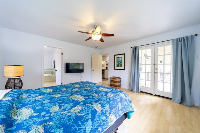 bedroom featuring light hardwood / wood-style floors, french doors, ceiling fan, and ensuite bathroom