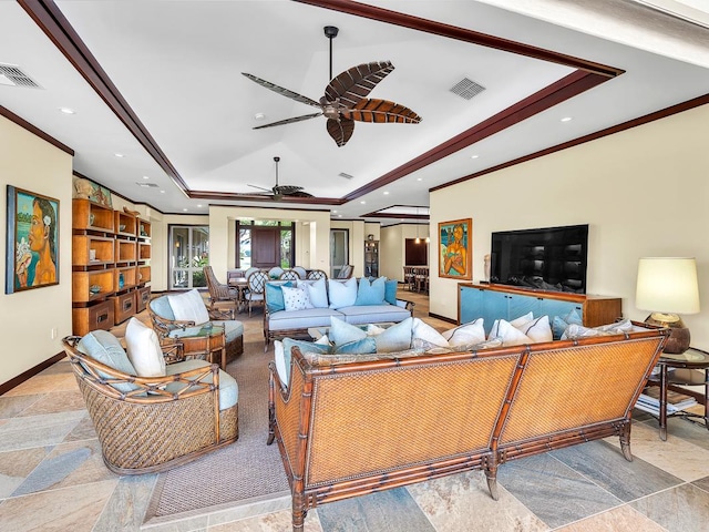 living room with ceiling fan, a raised ceiling, and crown molding