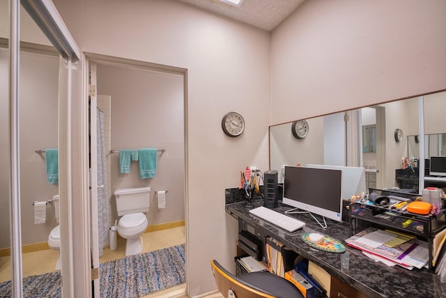 office space featuring a textured ceiling