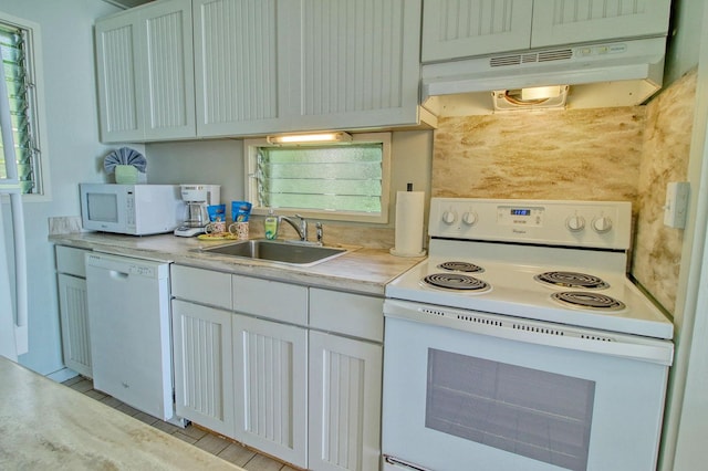 kitchen featuring white cabinets, white appliances, and sink