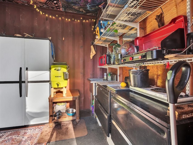 kitchen featuring refrigerator