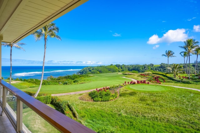 view of property's community featuring a water view and a yard