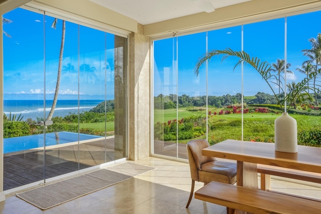 sunroom with a water view