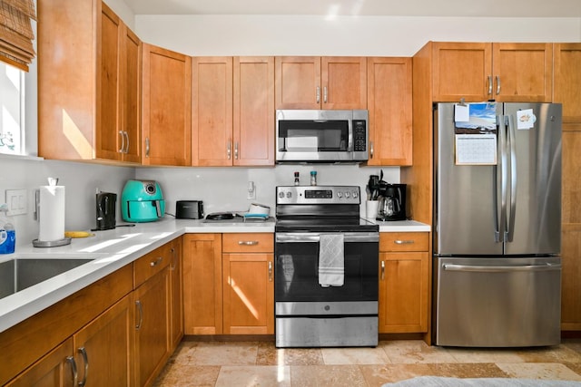 kitchen with appliances with stainless steel finishes