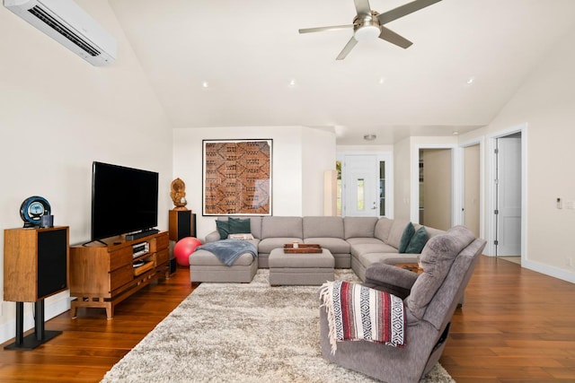 living room with dark hardwood / wood-style floors, ceiling fan, lofted ceiling, and a wall unit AC