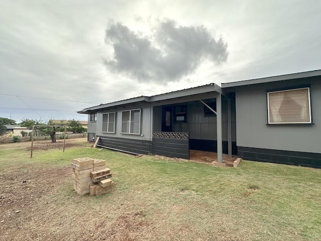 exterior space featuring a lawn