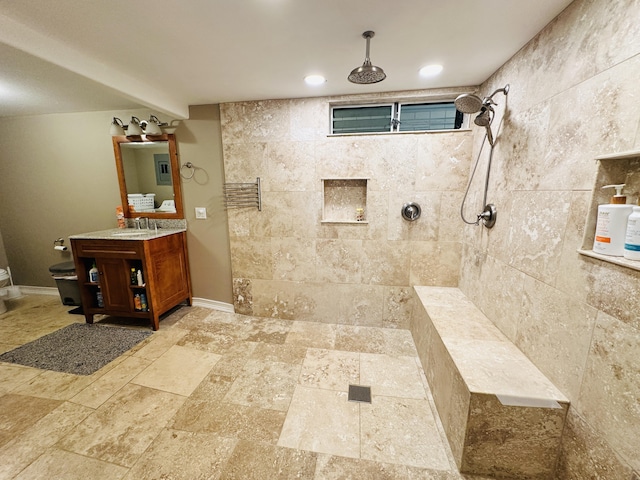 bathroom with vanity and walk in shower