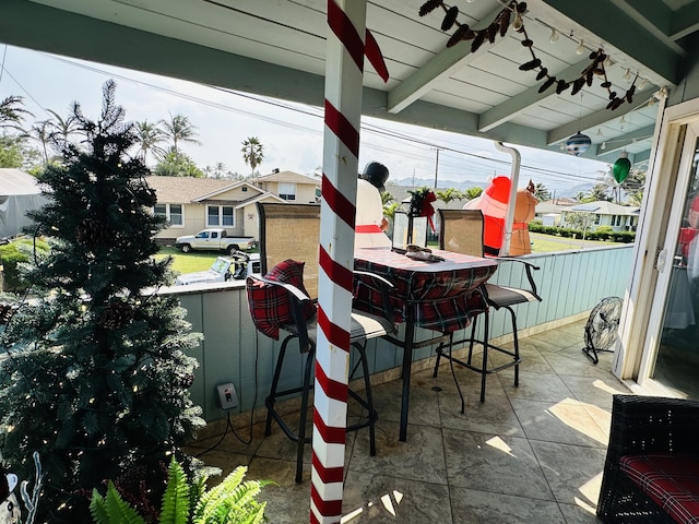 view of patio featuring exterior bar