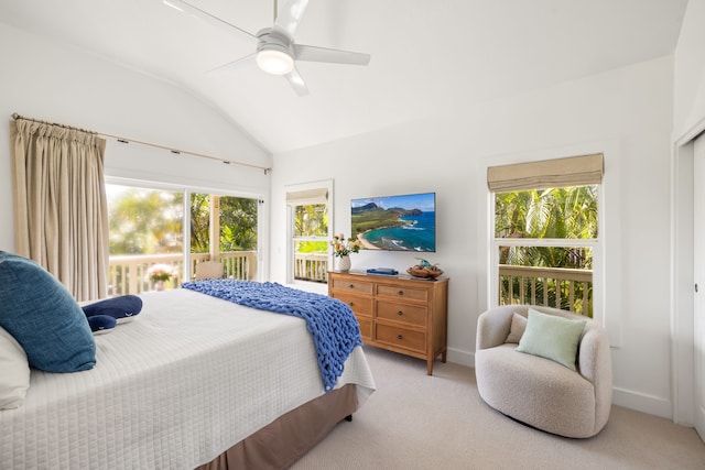 bedroom featuring ceiling fan, light colored carpet, and lofted ceiling